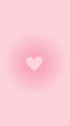 a pink background with a white heart in the center