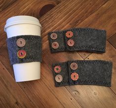 coffee cup cozyie and matching wristbands made from felt with buttons on them