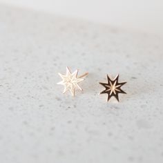 Meet Supernova, your newest little piece of luxury crafted in solid 14k gold. They have a stunning, rich gold color that catches the light in the most mesmerizing way. They have this gorgeous starburst shape that adds a touch of celestial magic to any outfit. The best part is their versatility. You can dress them up for a fancy night out or wear them with a casual jeans and t-shirt combo. They instantly elevate any look and add a touch of elegance and sophistication. It's like having a secret we Celestial Yellow Gold Earrings Tarnish Resistant, Elegant Starburst Jewelry As Gift, Elegant Starburst Jewelry Gift, Celestial 14k Yellow Gold Earrings, 14k Gold Celestial Yellow Gold Earrings, 14k Yellow Gold Celestial Earrings, 14k Gold Star Shaped Pierced Jewelry, Elegant Starburst Earrings For Anniversary, Rose Gold Star-shaped Pierced Jewelry