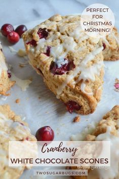 cranberry white chocolate scones with icing and cranberries on top