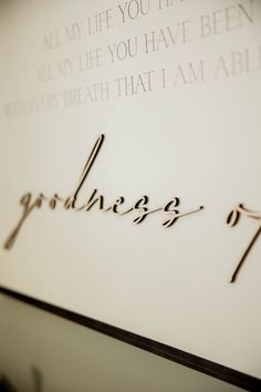 a close up of the writing on a wall