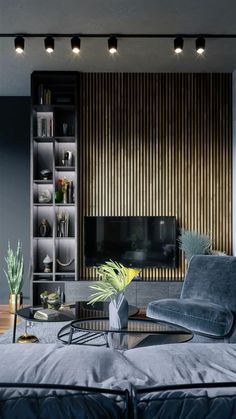 a living room with a couch, coffee table and bookcase in the corner next to it