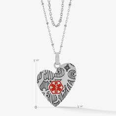 The Close To My Heart Layered Medical ID Necklace in Silver features an asymmetrical heart pendant with an intricate geometric design, and contrasting black inlay. The bold red medical symbol on the front of the necklace is designed to alert first responders to your medical information, custom engraved on the back. This custom-engravable pendant comes on a layered set of two hypoallergenic, stainless steel chains with an adjustable closure. The longer necklace is a beautiful satellite chain, whi Heart-shaped Engraved Metal Charm Necklaces, Black Stainless Steel Jewelry With Heart Charm, Black Stainless Steel Heart Necklace, Personalized Open Heart Metal Necklace, Engraved Metal Heart Necklace, Black Heart Necklace With Lobster Clasp, Black Nickel-free Heart Pendant Necklace, Black Heart-shaped Nickel-free Necklace, Nickel-free Heart Locket Necklace