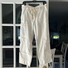 Size 29 Never Worn Anthropologie Soft White Cargo Style Pants With Rope Tie Belt. Inseam 25 White Straight Leg Cargo Pants For Loungewear, White Wide Leg Cargo Pants For Loungewear, White Cargo Pants For Loungewear, White Relaxed Fit Mid-rise Cargo Pants, White Mid-rise Relaxed Fit Cargo Pants, White Mid-rise Cotton Cargo Pants, Rope Tie, Cargo Style, Style Pants