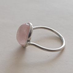 Handmade Rose quartz bohemian ring , you can wear this ring as a party wear ring .. Title - Rose Quartz stone ring Stone color - Pink Stone shape - oval Material - Sterling silver 925 Note - We use natural gemstones, so color shade may be little bit different .. we are giving you best quality rings on best price .. contact us for more quantity Handmade Adjustable Rose Quartz Rings, Silver Rose Quartz Crystal Ring, Pink Stone Rings, Green Stone Rings, Tiny Rings, Natural Gemstone Ring, Rose Quartz Stone, Bohemian Rings, Pink Stone