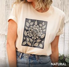 Bold black floral print on a boho cottagecore t-shirt for the girl who's both feminine and fierce. Hi there! We use high-quality t-shirt brands such as Bella&Canvas and Gildan Soft style. Oh! Let me tell you how soft, cozy, and comfy our t-shirts areNot to mention Bella&Canvas is an eco-friendly brand and Gildan Soft style uses eco-friendly materials️ You are more than welcome to specify which brand you would prefer at the checkout ☺️☺️ Here is some more information about t-shirts  ✓ All of our solid colors are 100% cotton ✓ All heather colors are polycotton mix which makes them feel extra soft😍😍 ✓ Our t-shirts are Unisex and size charts are available on the listing photos. 👕👚 ✓ Don't worry tag labels are easy to tear off 🔖So you don't have to worry about that unwanted itching anymore Tshirt Measurements, Group Cruise Shirts, Cottagecore Minimalist, Floral Tshirt, Neutral T Shirts, T Shirt Flowers, Boho Cottagecore, Floral Tee, Black Floral Print