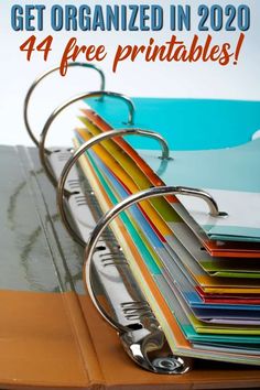 a stack of folders sitting on top of a table