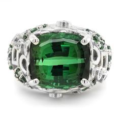 Tourmaline is known to symbolize friendship and wealth, and this 8.21 carat well crafted gemstone embodies just that. Cut as a cushion, the gemstones grandeur is brought to life. Perfectly matched diamonds and green tourmalines that compliment the gemstone and extend onto the band, this ring is the perfect combination for the modern woman. Green Tourmaline Ring, White Diamond Ring, Gold Cocktail Ring, Diamond Cocktail Rings, 14k White Gold Ring, White Gold Ring, Color Ring, Green Tourmaline, Dream Jewelry