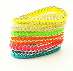 This traditional Chainmaille bracelet pattern is a fun and rewarding project for new Chainmaillers as well as experienced jewelry makers. The Fun mix of Bright and Neon Colored Silicone Rings and Aluminum Jump Rings makes a unique bracelet that you will enjoy wearing or giving to someone who loves a unique look. The jump rings are all non tarnishing, so this will always stay bright and shiny. We have included enough jump rings to make three S-T-R-E-T-C-H-Y bracelets up to 8 1/2 inches long. This is a Much chunkier than our standard Half Persian 3 in 1 kit, but Very lightweight! ♥Here is what you get: 45 - 6.4mm ID Aluminum Jump Rings 45 - 6.4mm ID Rubber Jump Rings PLUS, a pair of Ear Wires so you can make a matching pair of earrings with your leftover jump rings. INSTRUCTIONS - You Pick P Rings To Make, Rainbow Loom Designs, Bracelet Kit, Chainmaille Bracelet, Chain Maille Jewelry, Bracelet Kits, Rubber Rings, Chain Maille, Silicone Rings