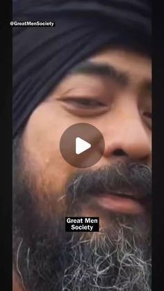 a man with a beard wearing a turban and looking at the camera, text reads great man comedy