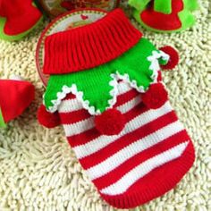 there are many stuffed animals on the floor together, including one with a santa hat