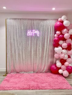 Silver sparkly curtains used as a photo back drop with a neon sign that says let's party, pink and white balloons, and a hot pink furry rug Pink Photo Backdrop Ideas, Barbie Backdrop Photoshoot, Y2k Photo Booth Ideas, Photo Booth With Balloons, Pink Photo Booth Backdrop, Photo Backdrop Ideas Birthday, Cute Backdrops For Pictures, Barbie Photo Booth, Pink Photo Booth