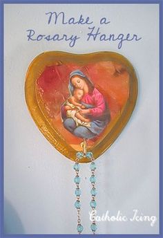 an image of a mother holding her baby in a heart shaped frame with the words make a rosary hanger