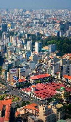 an aerial view of a city with tall buildings