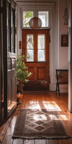 Modern farmhouse hallway with a blend of rustic wood and contemporary design Modern Farmhouse Hallway, Farmhouse Hallway Decor, Farmhouse Hallway, Rustic Entryway, Warm Decor, Hallway Design, Hallway Decor, Farmhouse Living, Hallway Decorating