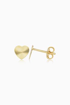 Our diamond-cut Heartthrob Studs radiate desire. Cute, classic heart shapes are crafted from solid gold with texturized ridges that give off an art deco appeal. Metal: 14k Yellow Gold Construction: Push Back Closure Dimensions: 6.5mm Tall, 7mm Wide Weight: 0.7 Grams Solid Gold Origin: Crafted in Vicenza, Italy 14k Gold Diamond Cut Heart Earrings, Classic Diamond-cut Heart Earrings For Valentine's Day, Gold Heart Earrings Diamond Cut Gift, 14k Gold Heart Earrings With Diamond Cut, Valentine's Day Yellow Gold Heart Earrings With Diamond Cut, 14k Gold Diamond Cut Heart Earrings For Anniversary, Anniversary Yellow Gold Diamond Cut Heart Earrings, Classic 14k Gold Heart Earrings For Formal Occasions, 14k Yellow Gold Heart Earrings With Diamond Cut