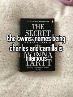 a book sitting on top of a bed next to a pink teddy bear with the caption, the secret in his name being charles and camila is hilarious