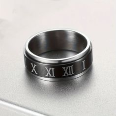 Precio bajo con envío gratis para usuario nuevo.,Amazon,Tiktok,AliExpress,Shein French Fashion Casual, Holiday Wear, Roman Numeral, Spinner Rings, Bag Packaging, Rings Simple, Stainless Steel Rings, Steel Ring, Roman Numerals