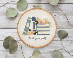 a cross stitch pattern with the words treat your self on it and some leaves around it