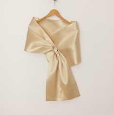 Elevate your evening look with this elegant champagne beige taffeta shoulder wrap stole. Designed for hands-free comfort, this dressy shawl is perfect for the mother of the bride or any formal event. The pull-through style offers a secure fit while adding a sophisticated touch to your attire. Ideal as a cover-up for weddings, galas, or special occasions. Rectangular shaped, it's available in three dimension alternatives: Short: 10.8" x 57.1" (27.5 x 145 cm) Medium: 11.4" x 65.0" (29 x 165cm) Long: 12" x 72.4" (30.5 x 184 cm) SHORT version fits upper body lengths (chest and arms) between 35.4" to 45.3" (90 cm to 115 cm), suitable for sizes S to M (US). MEDIUM version fits upper body lengths (chest and arms) between 35.4" and 53.2" (90cm to 135 cm), suitable for sizes S to L (US). LONG versi Dress Topper, Evening Wrap, Evening Wraps, Dior Vintage, Shoulder Wrap, Mom Wedding, Wedding Wraps, Pull Through, Dress Cover