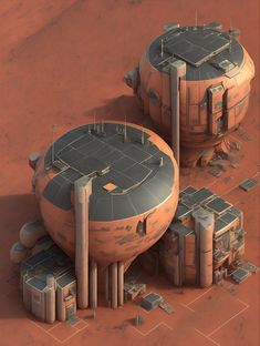 two large round structures sitting on top of a red desert floor next to each other