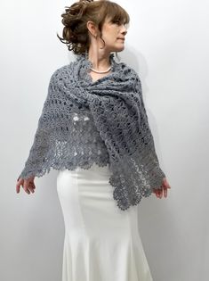 Gray Shawl İf you purchase 3 or more items please use ''BONUS'' as Coupon Code for 10% discount during the check out. MATERİAL: Mohair, wool, acrylic. COLOR: Gray as shown AVAİLABLE COLORS: White, cream, light gray, gray with glitter, dark gray, rose, burgundy, royal (cobalt) blue, navy blue, light beige, red, brown, mustard, pink, black. MEASUREMENTS: Approximately 21 inches wide (55 cm) / 71 inches long ( 180 cm ) CARE INSTRUCTIONS: - Wash at low temperature on a gentle machine cycle - Do not Elegant Lace Shawl For Winter, Elegant Winter Lace Shawl, Elegant Hand Knitted Shawl Scarf, Elegant Hand-knitted Shawl Scarf, Lace Shawl Scarf For Weddings, Lace Wedding Scarf Shawl, Elegant Handmade Scarves For Weddings, Elegant Handmade Mohair Shawl, Handmade Elegant Mohair Shawl