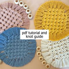 three circular crocheted rugs with yarn and buttons on the bottom one is yellow, the other is blue