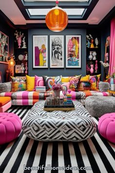 a living room filled with lots of colorful furniture and pictures on the wall above it