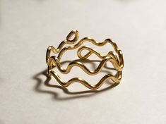 This simple, yet unique band is the perfect addition to any outfit. The material is strong but still adjustable so you get a perfect fit. Prices vary based on the durability of the design, as well as the gauge (or thickness) of the wire. All rings except for the Silver and Copper variations are tarnish resistant. Spiral Ring, Unique Bands, Hippy Gifts, Wire Ring, Wire Rings, The Wire, Pretty Rings, Color Ring, Style Expert