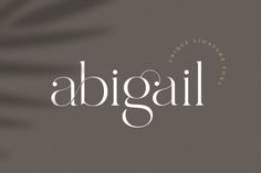 the word abigal is written in white on a gray background with palm fronds