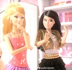 two barbie dolls standing next to each other in front of a closet with clothes on