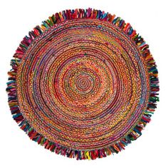 a round rug with multicolored fringes on the center and bottom, in various colors