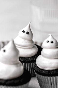 chocolate caramel cupcakes with meringue glazes and ghost eyes