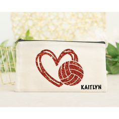 a white bag with a red heart on it