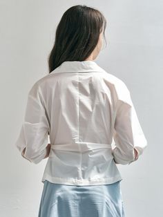 This is We’Dee’s shirt features a clean look with an asymmetrical design that adds a unique touch. The front has two buttons for easy wear and removal, serving as a focal point of the look.- Perfect for daily wear- Can be paired with different styles of bottoms to create various looks- The clean design makes it easy to style with any outfit Asymmetrical Design, Button Shirt, Clean Design, Easy Wear, Shirt White, Different Styles, Focal Point, Daily Wear, How To Wear