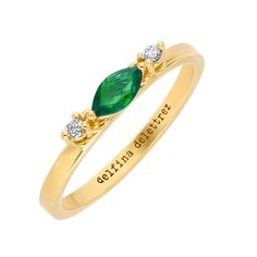 Classic gold band ring embellished with a ruby or a emerald marquise and finished with two playful white diamond charms dangling on the sides. Material: 18kt responsibly sourced yellow gold, ruby or emerald marquise 0.23ct, white diamonds 0.05ct ﻿Our diamonds are mined in conflict-free countries that are full participa Yellow Gold Marquise Emerald Ring, Gold Marquise Diamond Ring With Birthstone, Marquise Emerald Ring In Yellow Gold, Marquise Yellow Gold Diamond Ring For May Birthstone, Gold Marquise Cut Diamond Ring For May Birthstone, Marquise Cut Yellow Gold Emerald Ring As Gift, Yellow Gold Marquise Cut Emerald Ring Gift, Dancing Diamond, Marquise Ring