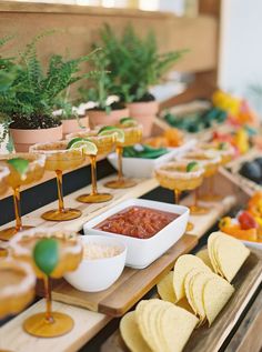 a buffet table filled with food and drinks