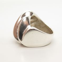 925 Sterling Silver Vintage Mexico Modernist Ring Size 7 Weight: 18.4g WELCOME TO PAWN SHOP We are an actual pawn shop and have been in business for over 25 years. Since 1990, our establishment has been serving a variety of clients by providing them with short term cash solutions and options of liquidity regarding their treasured heirlooms. Acknowledging that today′s customers are very sophisticated and are looking for a variety of investments, our acquisitions are hand-picked for our special cl Silver Wide Band Signet Ring Hallmarked, Formal Silver Oval Wide Band Ring, Collectible Sterling Silver Ring With Wide Band, Silver Wide Band Rings For Collectors, Modernist Wide Band Rings For Anniversary, Vintage Silver Concave Ring, Modernist Stamped 925 Rings For Anniversary, Silver Concave Dome Ring For Anniversary, Silver Ring With Polished Finish For Collectors