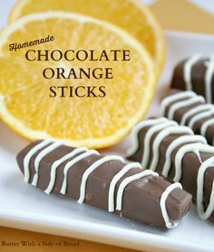 chocolate orange sticks on a white plate with an orange in the background and text overlay