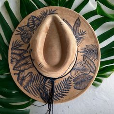 This Hat is Burned using Pyrography Techniques. Each Hat burned is drawn freehand therefore each one is a ONE of a KIND. Hats are all sprayed for weather and wear. Each Hat comes with a handcrafted Macrame Wall Hanger & a Signature Dust/Travel Bag. Bohemian Flat Brim Hand Painted Hat, Hand Dyed Adjustable Hat With Curved Brim, Bohemian Hand Painted Hats With Short Brim, Adjustable Hand Dyed Hat With Curved Brim, Bohemian Hand Painted Short Brim Hat, Bohemian Wide Brim Hand Painted Hat, Hand Painted Curved Brim Hats For Festivals, Hand Painted Curved Brim Festival Hats, Hand Painted Curved Brim Hat For Festival