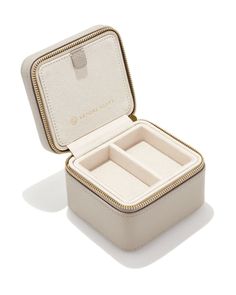 Our favorite travel companion, pretty enough to sit on your vanity, perfectly sized to throw in your tote. Whether you’re headed on vacation or are never not fashionably late, on-the-go accessorizing has never been easier with the Small Travel Jewelry Case in Taupe. Luxury Rectangular Travel Accessories Case, Rectangular Portable Travel Accessories Gift, Rectangular Portable Travel Accessories As Gift, Elegant Rectangular Travel Accessories With Removable Pouch, Elegant Rectangular Travel Accessories, Elegant Compact Travel Bag, Chic Compact Travel Bags, Icon Jewelry, Fashionably Late