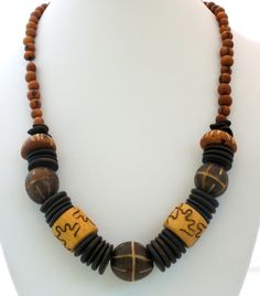 Chunky Wood Bead Necklace Hand Carved Vintage - The Jewelry Lady's Store Adjustable Brown Wooden Necklaces, Unique Brown Necklace With Large Beads, Brown Necklace With Large Beads, Vintage Brown Wooden Bead Necklaces, Adjustable Carved Brown Necklace, Unique Brown Wooden Bead Jewelry, Brown Wooden Beaded Jewelry, Brown Wooden Necklace With Large Beads, Unique Carved Brown Necklace