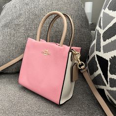 100% Authentic Nwt Coach Mini Cally Crossbody In Pink Beige Colorblock #5691 Style #5691 Color: Pink/Beige Colorblock Leather Handbag Condition Is New With Tags. Refined Pebble Leather Two Credit Card Slots Inside Multifunction Pocket Magnetic Snap Closure, Fabric Lining Handles With 3 3/4" Drop Detachable Strap With 22 3/4" Drop For Shoulder Or Crossbody Wear Dimensions: 6 3/4" (L) X 6 1/2" (H) X 3 1/4" (W) Chic Leather Color Block Bag, Pink Color Block Shoulder Bag, Color Block Leather Bags, Coach Market Tote, Crochet Phone Bag, Chloe Bags Handbags, Coach Parker, Coach Tote Bags, Small Crossbody Purse