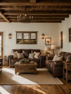 a living room with couches, chairs and coffee table in the middle of it