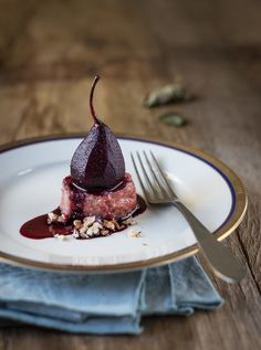 a piece of cake on a plate with a fork