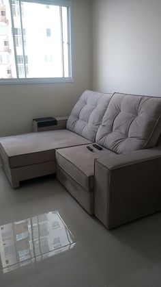 a living room with a couch and table in it