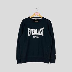 Vintage Rare EVERLAST Crewneck Sweatshirt Big Logo EVERLAST Jumper Pullover EVERLAST Sweater Black Colour Unisex X-Large Size CONDITION :- ✅GOODUSED CONDITION. ✅NO STAINS  ✅NO HOLE ITEM DESCRIPTION:- ✅SIZE: L-LARGE ✅MATERIAL : COTTON ✅THIS USED & VINTAGE ITEMS, SO DON'T EXPECTED IT TO BE LIKE NEW CONDITION!! MEASUREMENT: ✅ARMPIT TO ARMPIT : 22.5 INCH ✅LENGHT NECK TO : 27 INCH  ✅SHOULDHER : 19.5 INCH ✅SLEEVE: 24 INCH PLEASE REFER PHOTO BEFORE ORDER √ALL MEASUREMENTS ARE TAKEN WITH THE GARMENT FLAT ON THE GROUND √WE SHIP BY POST VIA MALAYSIA INTERNATIONAL REGISTERED/SIGNED FOR WITH TRACKING NO. TRACKING NUMBER WILL BE GIVEN. √THE PARCEL WILL BE ARRIVE WITHIN 10-14 WORKING DAYS OR MORE DUE TO THE LOCATION & CUSTOMS CLEARINGS. √BUYER DON'T HESITATE TO ASK ME IF ANY INQUIRY ABOUT ITEM BEFORE PU Vintage Everlast, Black Colour, Sweater Black, Black Sweaters, Large Size, Mens Sweatshirts, Crewneck Sweatshirt, Sweat Shirt, Black Color