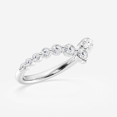 Give your wedding stack a touch of surreal beauty with this floating diamond curve band. The pointed curve of lustrous round lab grown diamonds is perfect for pairing with marquise or pear shaped engagement rings. Brides that aren't afraid to shine with all their might will adore this dazzling floating diamond stackable wedding band! White Brilliant Cut Stackable Rings For Anniversary, White Diamond Ring With Half Eternity For Formal Events, White Diamond Rings With Open Band, White Gold Cluster Ring With Half Eternity, White Rings For Formal Occasions With Half Eternity, White Half Eternity Rings For Formal Occasions, Formal White Rings With Half Eternity, Formal White Diamond Half Eternity Ring, White Platinum Half Eternity Diamond Ring