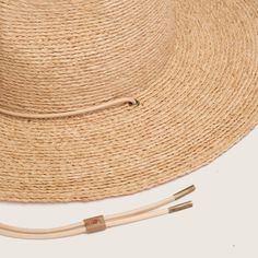 Our much loved, best selling Austin is back with an updated straw weave and in our new Sand colour! ﻿From the desert to the sea, Austin is hand braided from natural raffia straw. Designed to get you from dusty roads to salty seas and everywhere in between. The wide brim ensures sun protection and the chin strap will keep your hat on your head for every adventure. Adjustable Coastal Straw Hat Made Of Toquilla, Everyday Natural Toquilla Straw Hat, Natural Braided Straw Hat With Flat Brim, Beachy Woven Straw Hat For Travel, Natural Woven Sun Hat For Vacation, Coastal Style Straw Hat For Travel, Natural Color Beachy Hat For Travel, Natural Color Beachy Travel Hat, Natural Beachy Hat For Travel