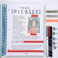 a notebook with an image of a person on it and some markers next to it